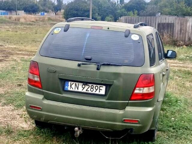 Зеленый Киа Соренто, объемом двигателя 2.5 л и пробегом 260 тыс. км за 3000 $, фото 2 на Automoto.ua