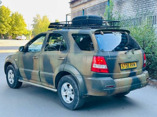 Зеленый Киа Соренто, объемом двигателя 2.5 л и пробегом 280 тыс. км за 3587 $, фото 4 на Automoto.ua