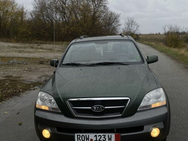 Зеленый Киа Соренто, объемом двигателя 2.5 л и пробегом 250 тыс. км за 3999 $, фото 1 на Automoto.ua