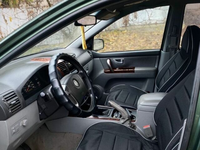 Зеленый Киа Соренто, объемом двигателя 2.5 л и пробегом 278 тыс. км за 4500 $, фото 7 на Automoto.ua