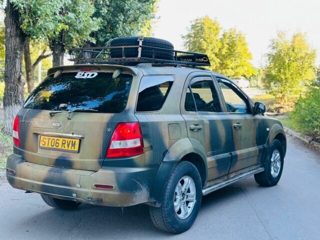 Зеленый Киа Соренто, объемом двигателя 2.5 л и пробегом 280 тыс. км за 3587 $, фото 8 на Automoto.ua