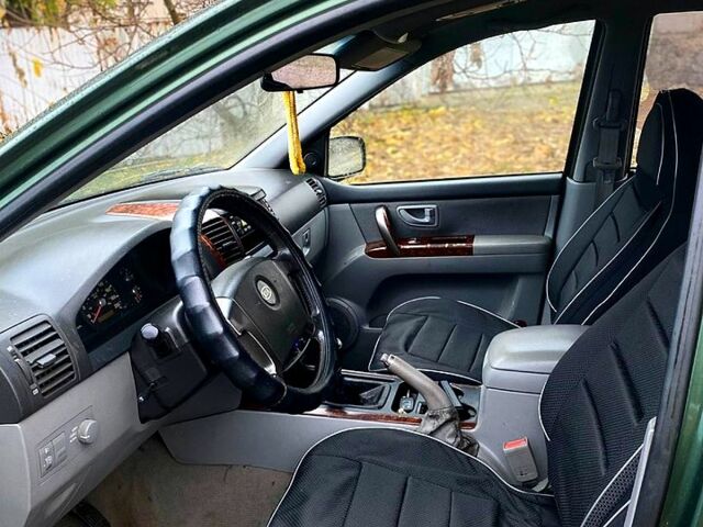 Зеленый Киа Соренто, объемом двигателя 2.5 л и пробегом 278 тыс. км за 4500 $, фото 6 на Automoto.ua