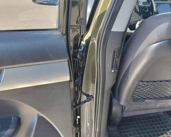 Зелений Кіа Соренто, об'ємом двигуна 2.4 л та пробігом 265 тис. км за 10999 $, фото 12 на Automoto.ua