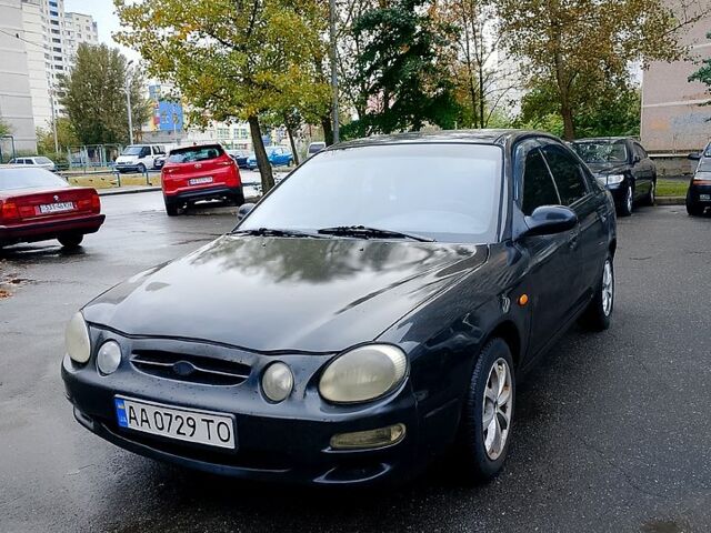 Черный Киа Спектра, объемом двигателя 1.8 л и пробегом 0 тыс. км за 1500 $, фото 1 на Automoto.ua