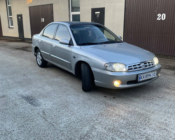 Серый Киа Спектра, объемом двигателя 1.6 л и пробегом 252 тыс. км за 2700 $, фото 1 на Automoto.ua