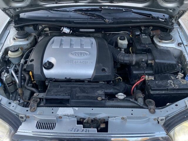 Серый Киа Спектра, объемом двигателя 1.6 л и пробегом 250 тыс. км за 2700 $, фото 6 на Automoto.ua