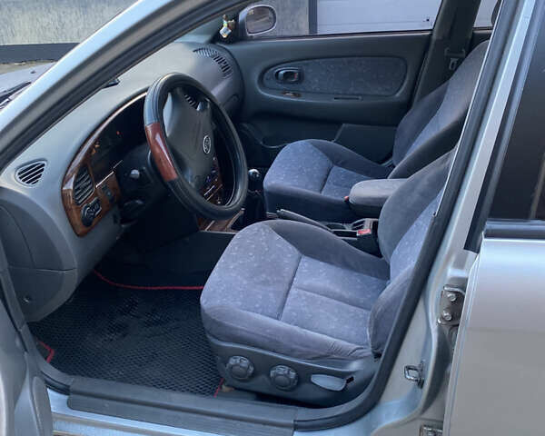 Серый Киа Спектра, объемом двигателя 1.6 л и пробегом 252 тыс. км за 2700 $, фото 5 на Automoto.ua