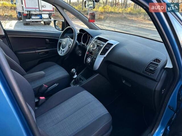 Синий Киа Венга, объемом двигателя 1.6 л и пробегом 210 тыс. км за 6990 $, фото 15 на Automoto.ua