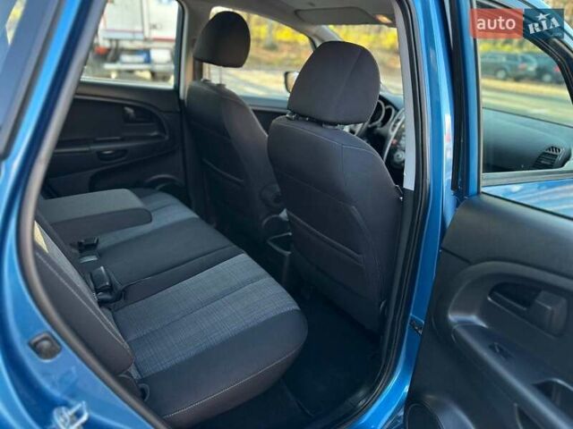 Синий Киа Венга, объемом двигателя 1.6 л и пробегом 210 тыс. км за 6990 $, фото 18 на Automoto.ua