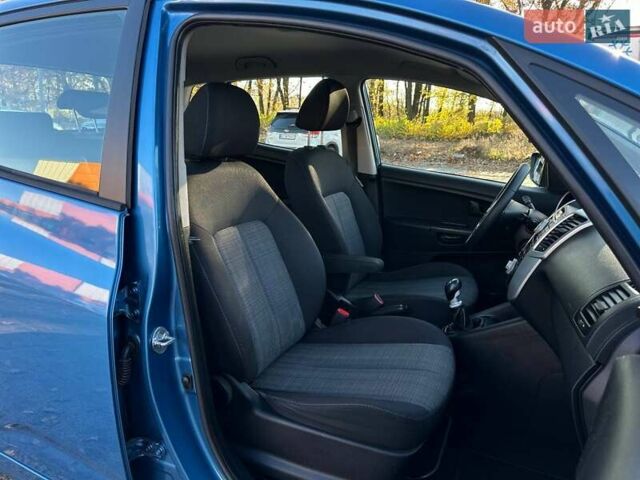 Синій Кіа Венга, об'ємом двигуна 1.6 л та пробігом 210 тис. км за 6990 $, фото 13 на Automoto.ua