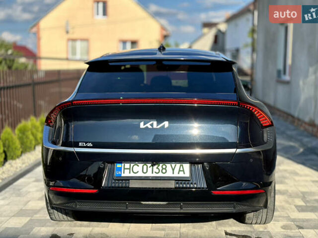 Синий Киа EV6, объемом двигателя 0 л и пробегом 70 тыс. км за 26000 $, фото 4 на Automoto.ua