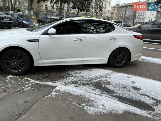 Белый Киа K5, объемом двигателя 2 л и пробегом 226 тыс. км за 9500 $, фото 15 на Automoto.ua
