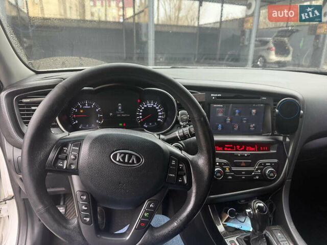 Белый Киа K5, объемом двигателя 2 л и пробегом 226 тыс. км за 9500 $, фото 23 на Automoto.ua