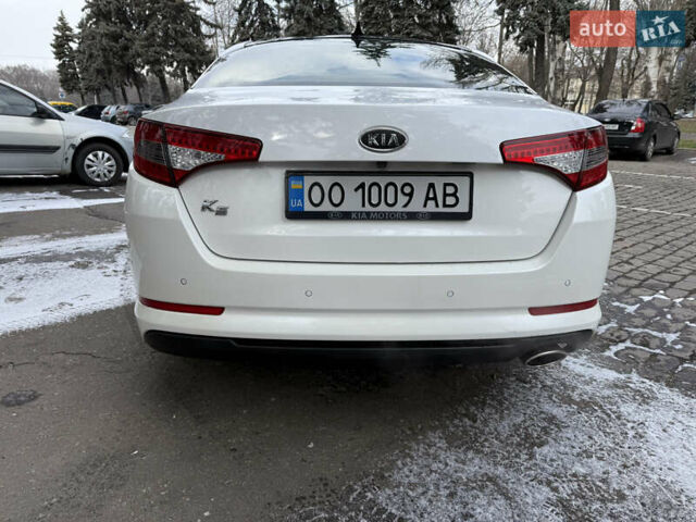 Белый Киа K5, объемом двигателя 2 л и пробегом 226 тыс. км за 9500 $, фото 13 на Automoto.ua