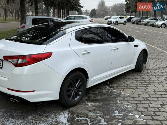 Белый Киа K5, объемом двигателя 2 л и пробегом 226 тыс. км за 9500 $, фото 17 на Automoto.ua