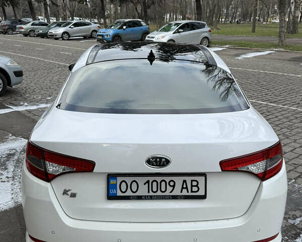 Белый Киа K5, объемом двигателя 2 л и пробегом 226 тыс. км за 9500 $, фото 11 на Automoto.ua