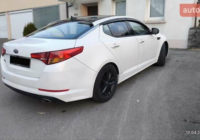 Белый Киа K5, объемом двигателя 2 л и пробегом 363 тыс. км за 7600 $, фото 7 на Automoto.ua