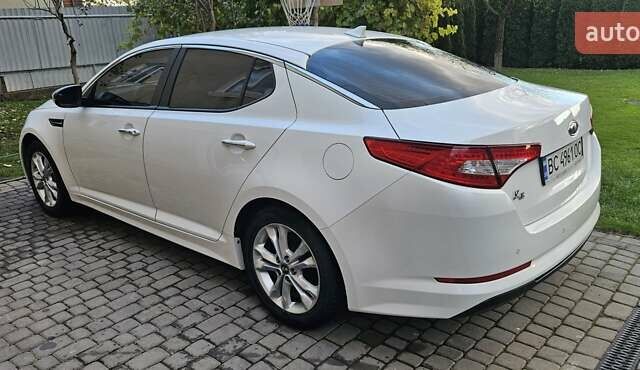 Білий Кіа K5, об'ємом двигуна 2 л та пробігом 255 тис. км за 10300 $, фото 1 на Automoto.ua