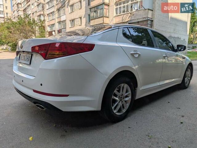 Белый Киа K5, объемом двигателя 2 л и пробегом 298 тыс. км за 7700 $, фото 8 на Automoto.ua