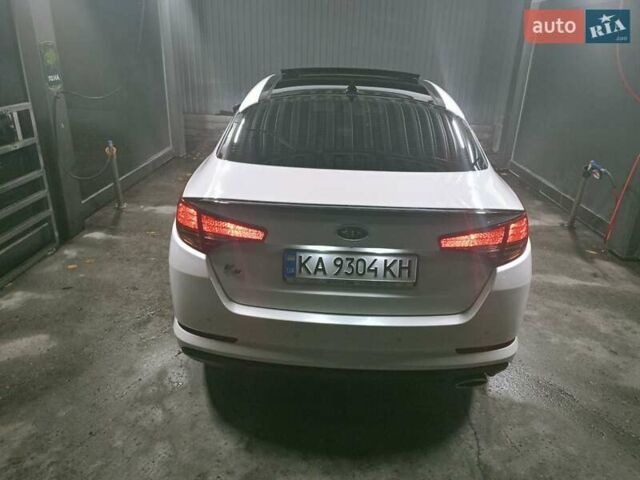 Белый Киа K5, объемом двигателя 2 л и пробегом 216 тыс. км за 9500 $, фото 19 на Automoto.ua