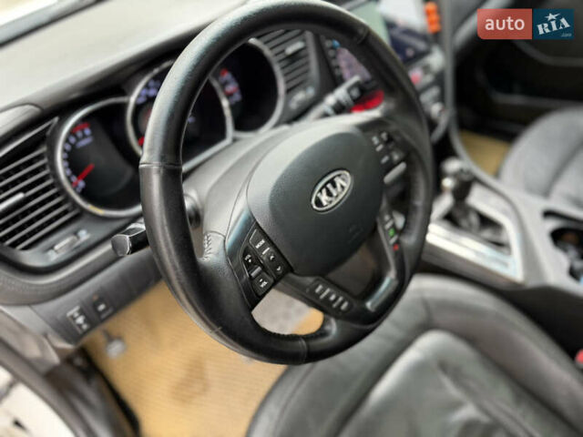 Белый Киа K5, объемом двигателя 2 л и пробегом 365 тыс. км за 7700 $, фото 11 на Automoto.ua
