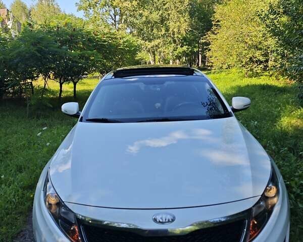 Белый Киа K5, объемом двигателя 2 л и пробегом 240 тыс. км за 9990 $, фото 13 на Automoto.ua