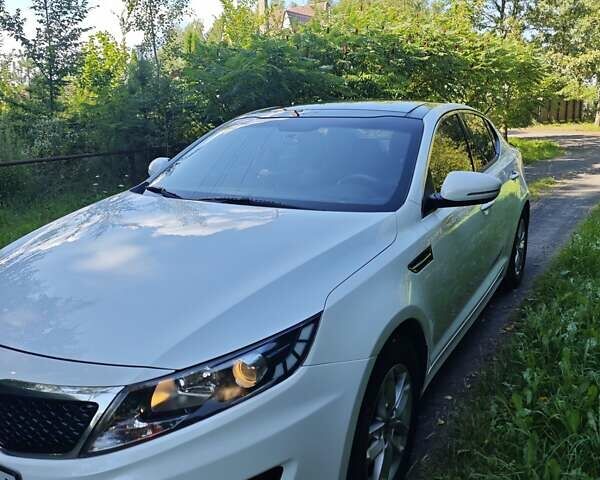 Белый Киа K5, объемом двигателя 2 л и пробегом 240 тыс. км за 9990 $, фото 7 на Automoto.ua