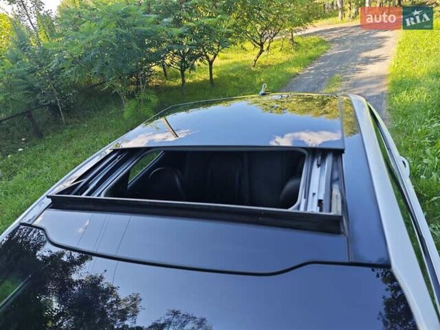 Белый Киа K5, объемом двигателя 2 л и пробегом 240 тыс. км за 9990 $, фото 12 на Automoto.ua