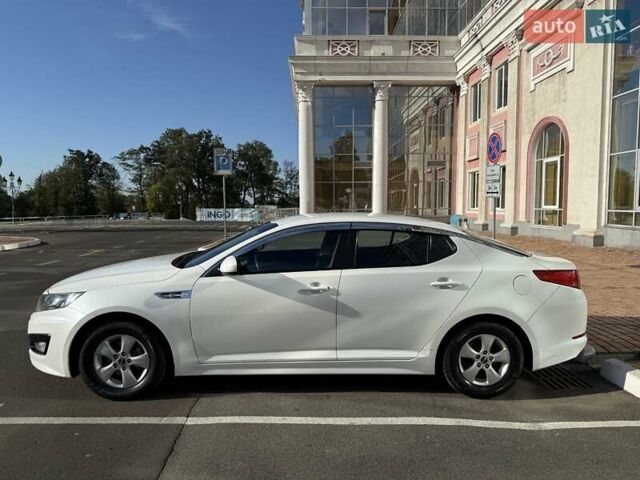 Белый Киа K5, объемом двигателя 2 л и пробегом 98 тыс. км за 9000 $, фото 23 на Automoto.ua