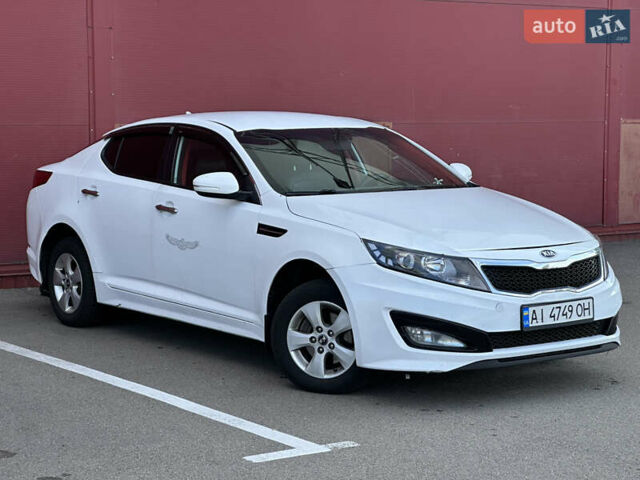 Білий Кіа K5, об'ємом двигуна 2 л та пробігом 422 тис. км за 6999 $, фото 2 на Automoto.ua