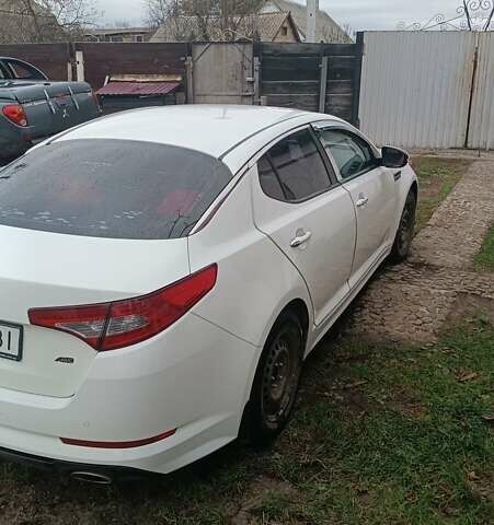 Белый Киа K5, объемом двигателя 2 л и пробегом 230 тыс. км за 10200 $, фото 6 на Automoto.ua