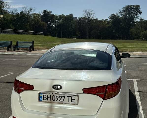 Белый Киа K5, объемом двигателя 2 л и пробегом 98 тыс. км за 9000 $, фото 27 на Automoto.ua