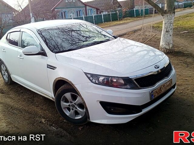 Белый Киа K5, объемом двигателя 20 л и пробегом 430 тыс. км за 8000 $, фото 3 на Automoto.ua