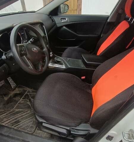 Белый Киа K5, объемом двигателя 2 л и пробегом 230 тыс. км за 10200 $, фото 8 на Automoto.ua