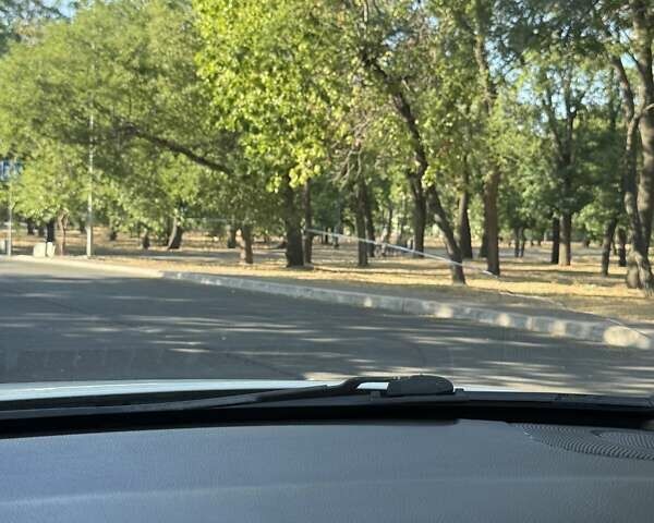 Белый Киа K5, объемом двигателя 2 л и пробегом 98 тыс. км за 9000 $, фото 24 на Automoto.ua