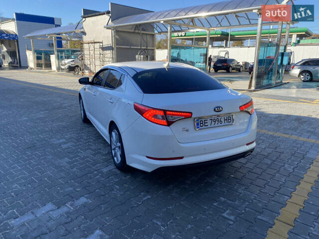 Белый Киа K5, объемом двигателя 2 л и пробегом 450 тыс. км за 8000 $, фото 6 на Automoto.ua