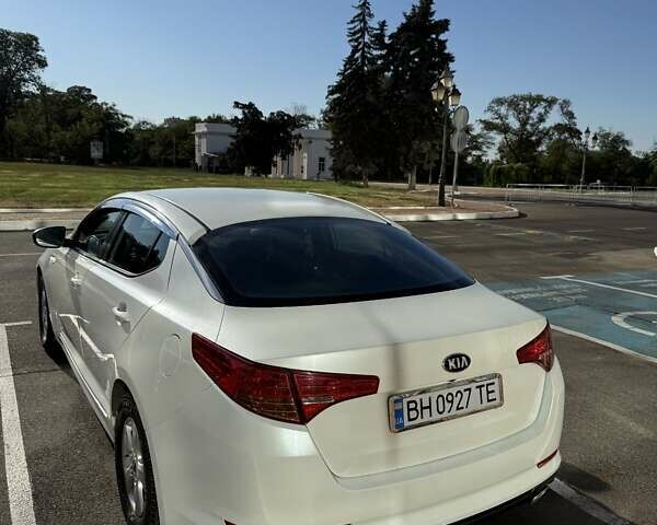 Белый Киа K5, объемом двигателя 2 л и пробегом 98 тыс. км за 9000 $, фото 25 на Automoto.ua