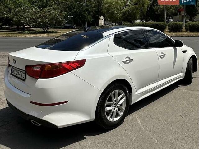 Белый Киа K5, объемом двигателя 2 л и пробегом 255 тыс. км за 10500 $, фото 1 на Automoto.ua