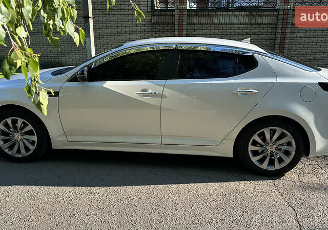 Білий Кіа K5, об'ємом двигуна 2 л та пробігом 209 тис. км за 10300 $, фото 7 на Automoto.ua