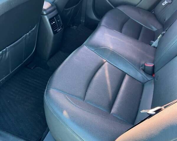 Белый Киа K5, объемом двигателя 2 л и пробегом 225 тыс. км за 10000 $, фото 9 на Automoto.ua
