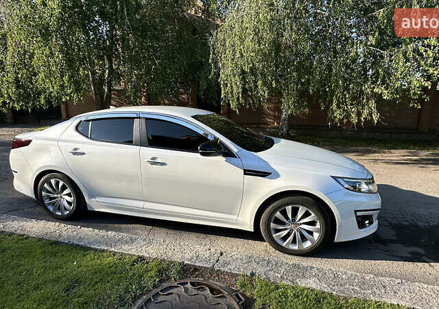 Білий Кіа K5, об'ємом двигуна 2 л та пробігом 209 тис. км за 10300 $, фото 1 на Automoto.ua