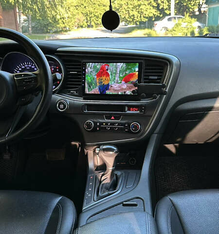 Білий Кіа K5, об'ємом двигуна 2 л та пробігом 209 тис. км за 10300 $, фото 13 на Automoto.ua