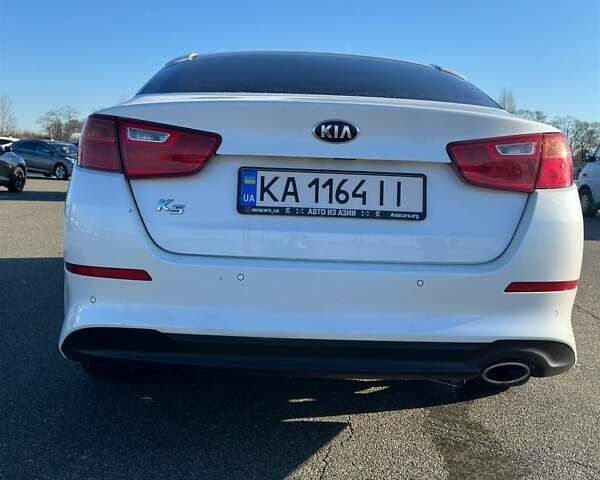 Белый Киа K5, объемом двигателя 2 л и пробегом 225 тыс. км за 10000 $, фото 3 на Automoto.ua