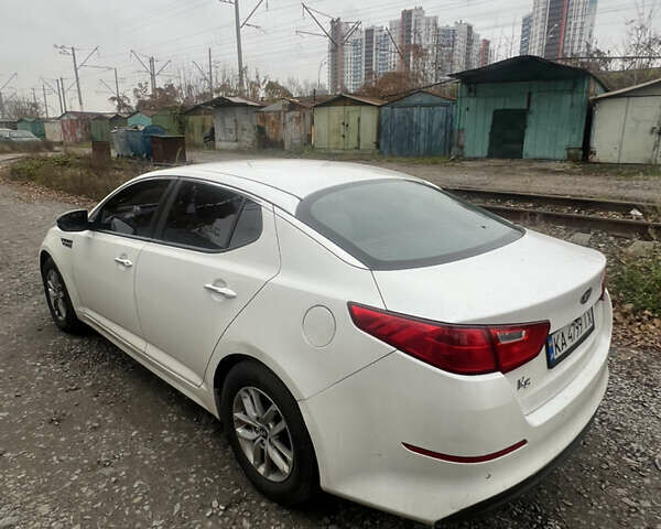 Белый Киа K5, объемом двигателя 2 л и пробегом 295 тыс. км за 7900 $, фото 5 на Automoto.ua