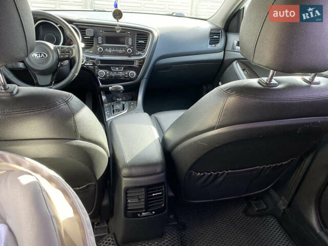 Белый Киа K5, объемом двигателя 2 л и пробегом 190 тыс. км за 11000 $, фото 9 на Automoto.ua
