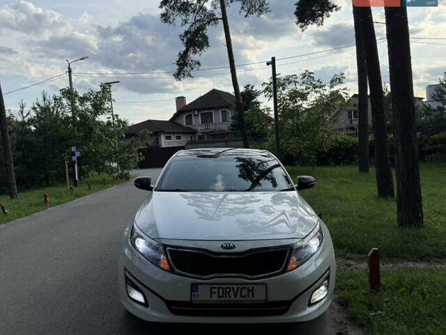 Белый Киа K5, объемом двигателя 2 л и пробегом 372 тыс. км за 8500 $, фото 1 на Automoto.ua