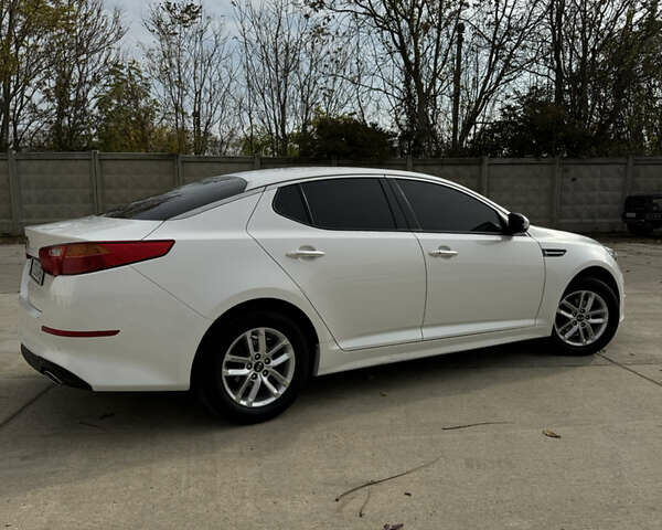 Белый Киа K5, объемом двигателя 2 л и пробегом 199 тыс. км за 12700 $, фото 12 на Automoto.ua