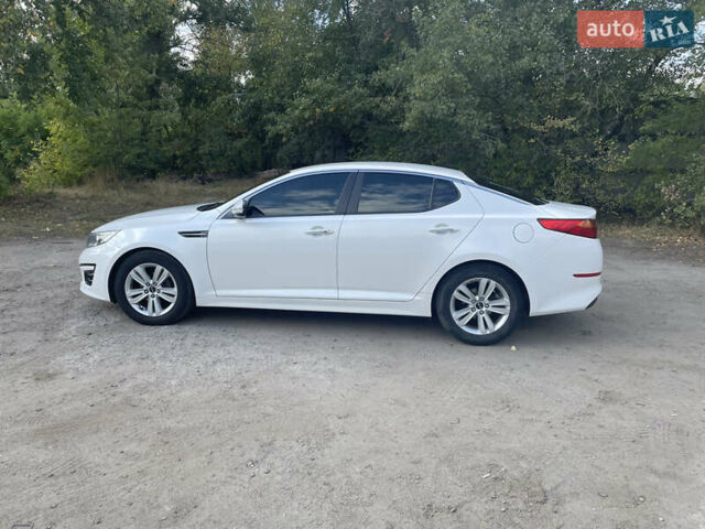 Белый Киа K5, объемом двигателя 2 л и пробегом 296 тыс. км за 12000 $, фото 7 на Automoto.ua