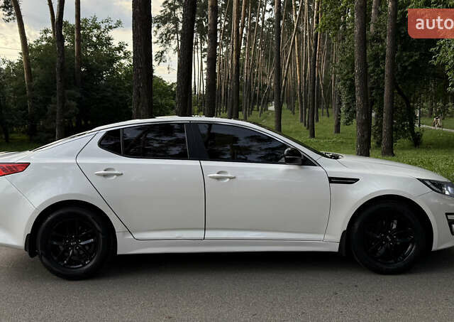 Белый Киа K5, объемом двигателя 2 л и пробегом 372 тыс. км за 8500 $, фото 4 на Automoto.ua
