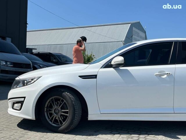 Белый Киа K5, объемом двигателя 2 л и пробегом 246 тыс. км за 10240 $, фото 12 на Automoto.ua